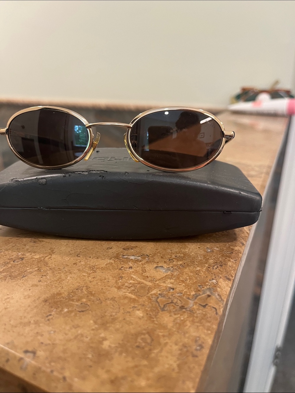 Police Oval Gold Frame Sunglasses with Brown Lenses and Case